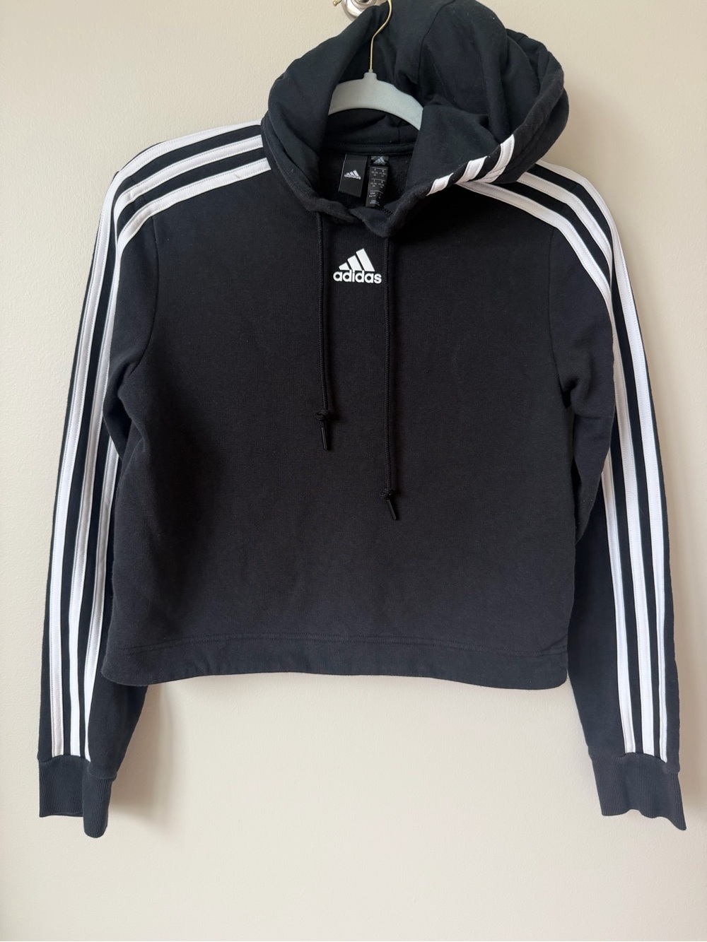 Adidas black cropped hoodie with white stripes on sleeves, size XS